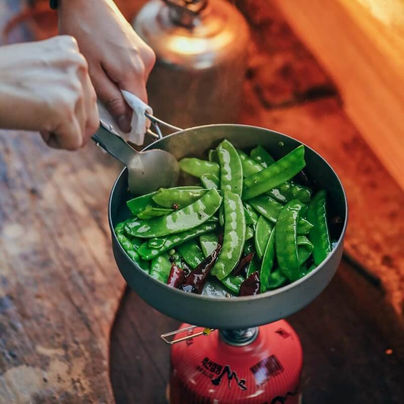 Versatile cooking options with the Boundless Voyage Titanium Set's lid with strainer holes