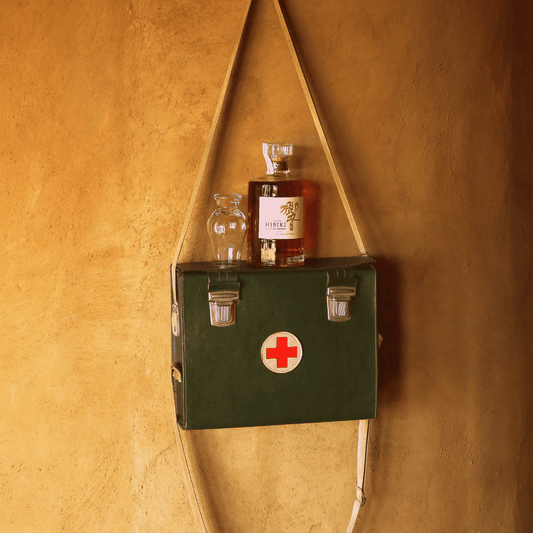 Backcountry First Aid: A Medical Kit Hanging on a Wall - Be Prepared for Injuries in the Wilderness.