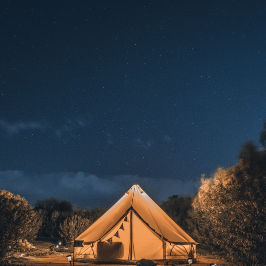 Nighttime view of a sturdy and reliable tent, perfect for outdoor camping adventures.
