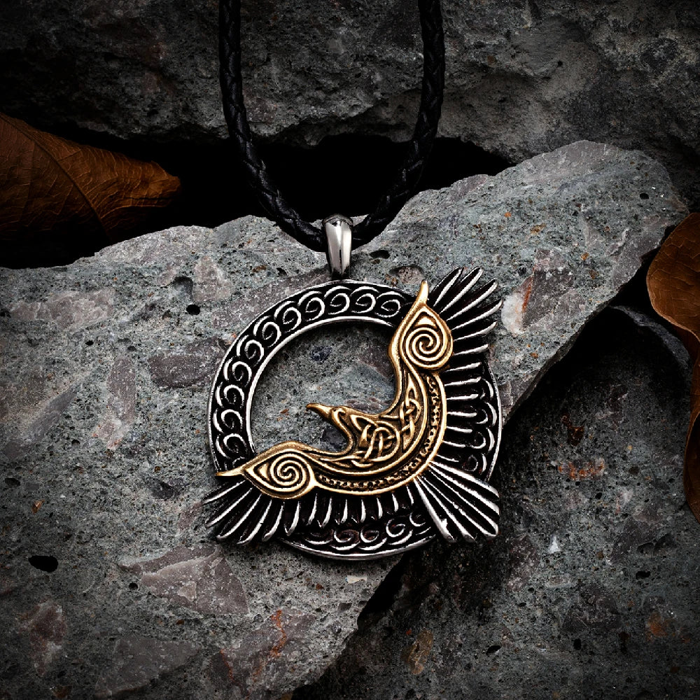 Artistic shot of the Odin’s Raven Flight Necklace pendant, highlighting the wingspan and intricate features of the raven in Viking lore.