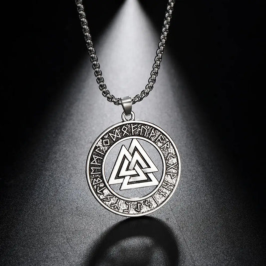 Detailed image of the Valknut Rune Circle Necklace showing the intricate design of the Valknut surrounded by runes on a zinc alloy pendant, suspended from a stainless steel chain.