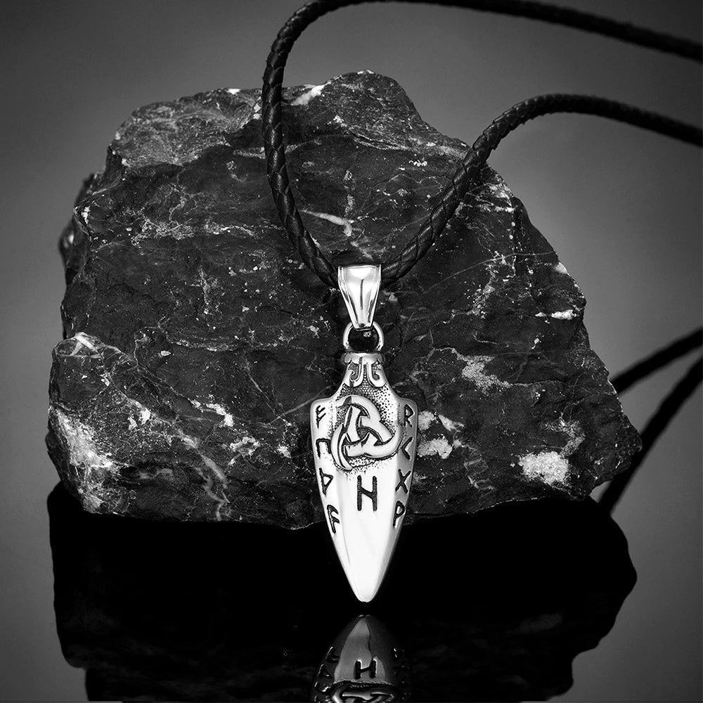 Lifestyle image of a person wearing Odin’s Gungnir Spear Necklace with a leather band, demonstrating its stylish and symbolic appeal.