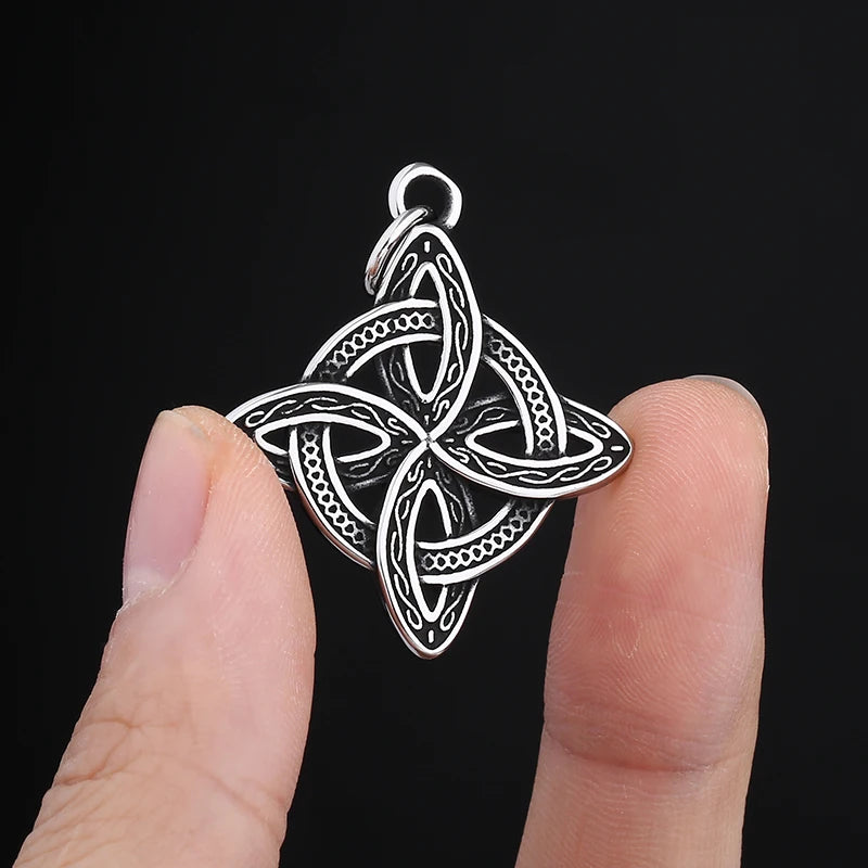 Fashion-forward styling of the Celtic Essence Pendant Necklace, featuring both the Triquetra and Quaternary designs, perfect for those who value heritage and style.