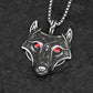 Elegant shot of the Fenris Wolf pendant featuring red glowing eyes, showcased against a dark background to emphasize its mystical allure.