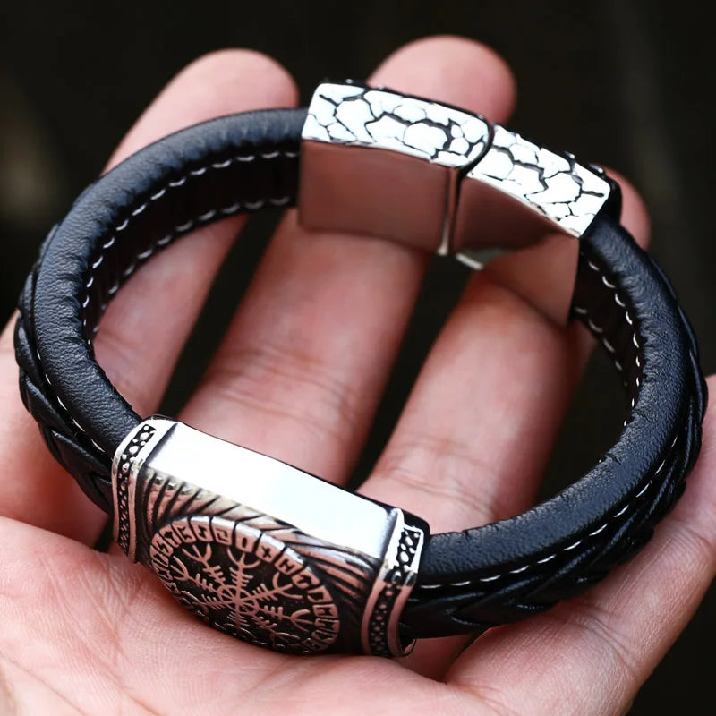 Lifestyle image of a person wearing the Vegvisir Leather Bracelet, emphasizing its stylish compatibility with everyday outfits.