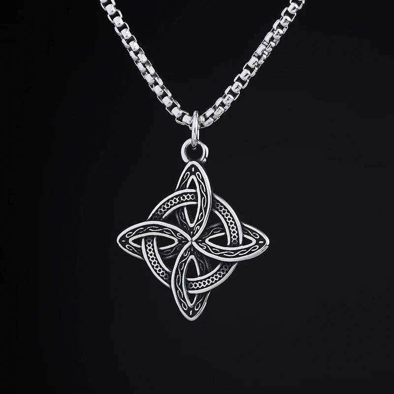 Elegant display of the Celtic Essence Pendant with the Quaternary Knot design in stainless steel, representing the four elements on a sleek chain.