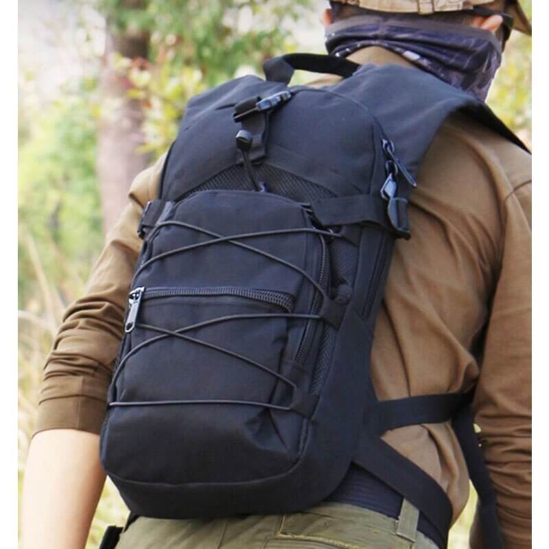 Tacti-Pack 15L backpack alongside camping gear